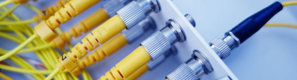 Fiber optic cables in a network patch panel